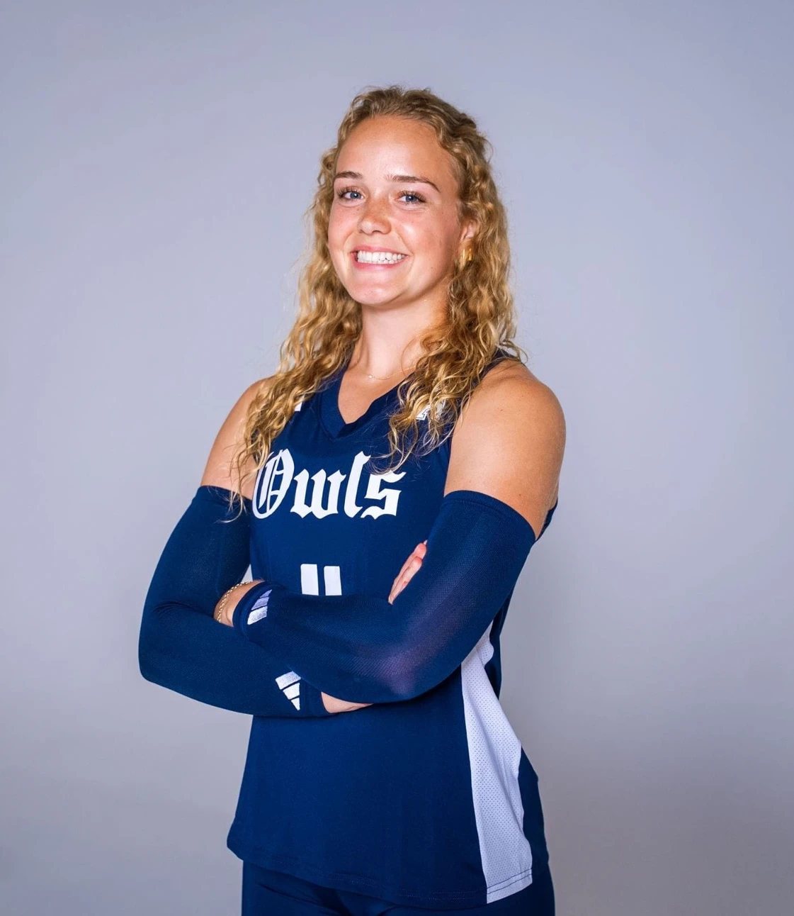 Darby Harris, Rice University volleyball defensive specialist, wearing Owls jersey number 11